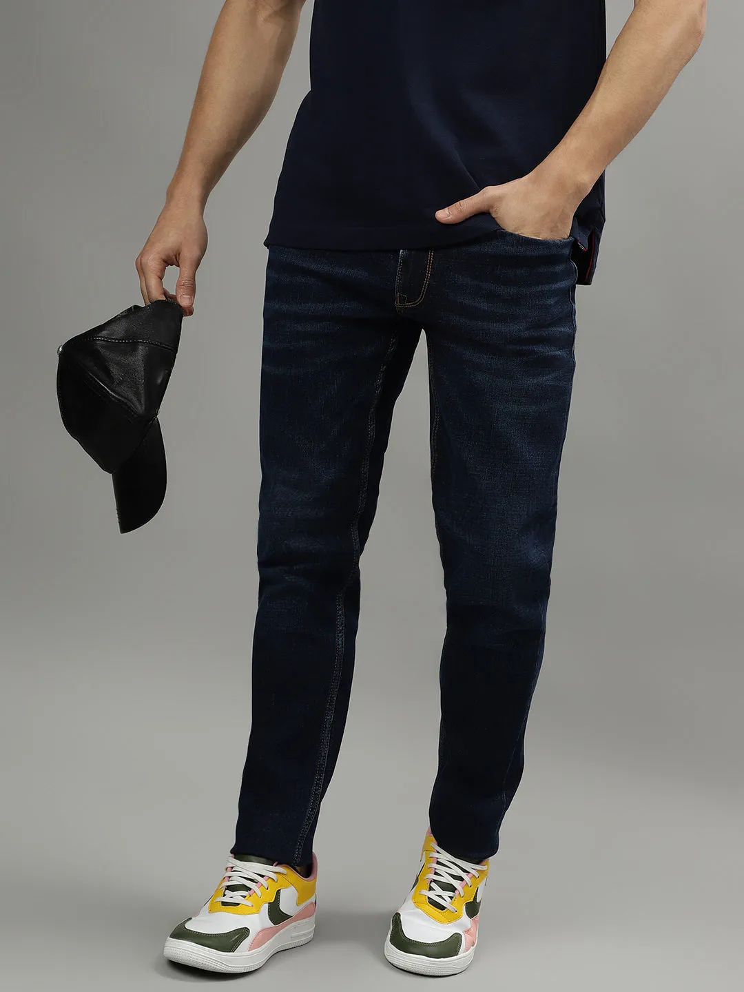 Iconic Men Blue Solid Mid-Rise Tapered Fit Jeans